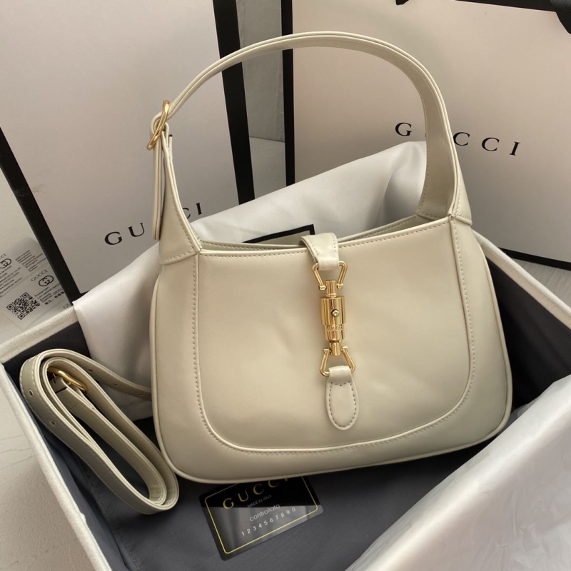 G*u*i top handle bags